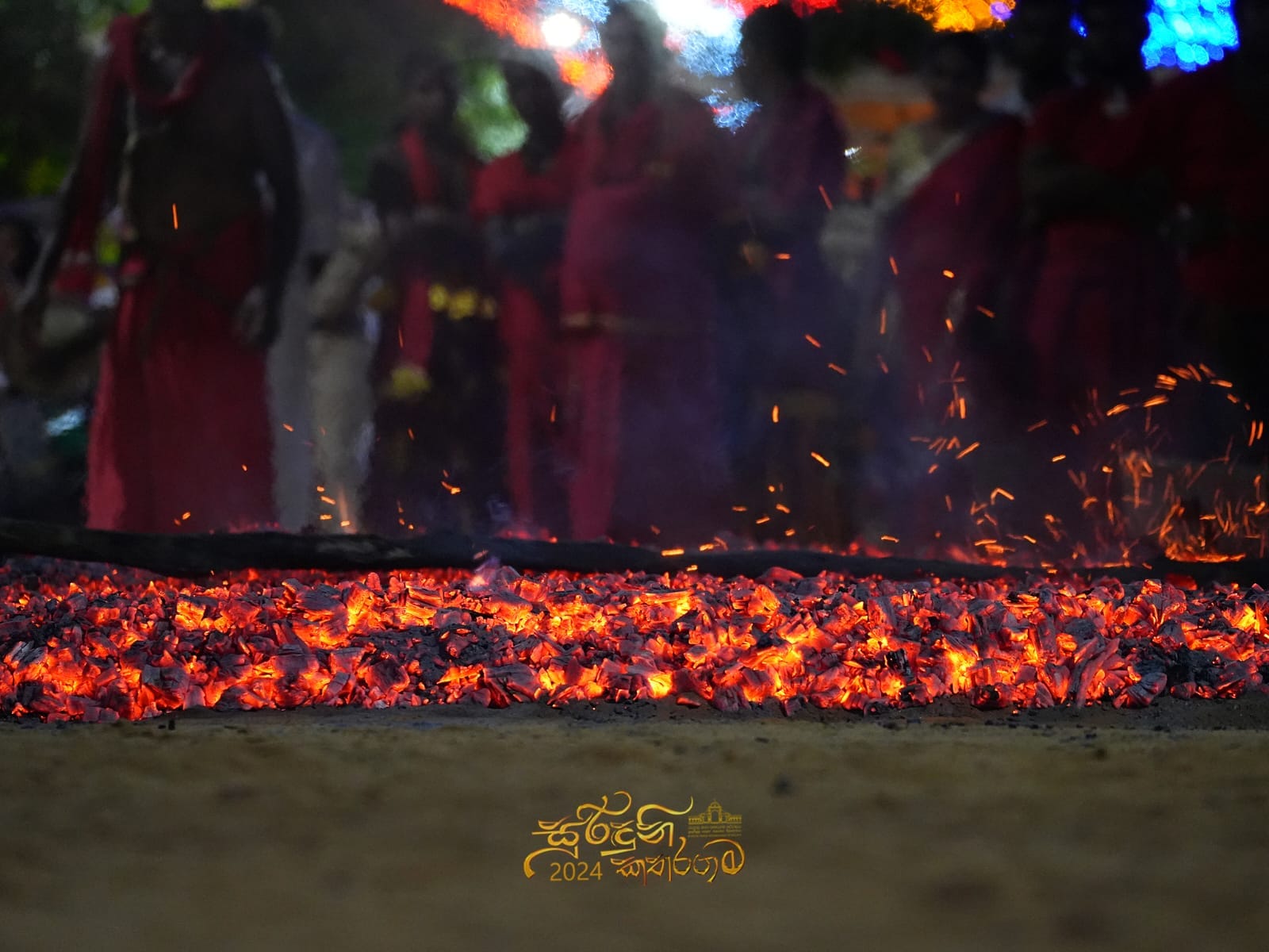 Devotees performing firewalking at Kataragama Esala Perahera